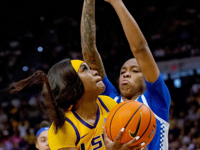 Mar 3, 2024; Baton Rouge, Louisiana, USA; LSU Lady Tigers guard Aneesah Morrow (24) shoots against Kentucky Wildcats guard Eniya Russell (4) during the second half at Pete Maravich Assembly Center. Mandatory Credit: Matthew Hinton-USA TODAY Sports