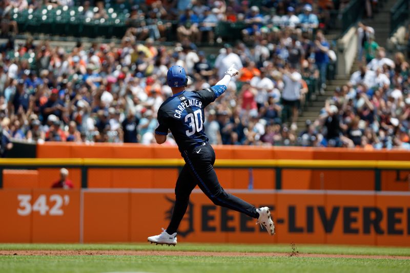 May 25, 2024; Detroit, Michigan, USA; Detroit Tigers outfielder Kerry Carpenter (30) hits a home run in the first inning of the game against the Toronto Blue Jays at Comerica Park. Mandatory Credit: Brian Bradshaw Sevald-USA TODAY Sports