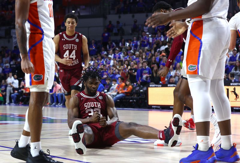 Jan 25, 2023; Gainesville, Florida, USA; South Carolina Gamecocks forward Josh Gray (33) reacts and celebrates after he made a basket in the act of getting fouled and shoots and one against the Florida Gators during the first half at Exactech Arena at the Stephen C. O'Connell Center. Mandatory Credit: Kim Klement-USA TODAY Sports