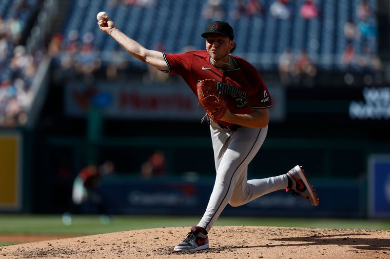 Jun 19, 2024; Washington, District of Columbia, USA; Arizona Diamondbacks pitcher Brandon Pfaadt (32) pitches against the Washington Nationals during the second inning at Nationals Park. Mandatory Credit: Geoff Burke-USA TODAY Sports