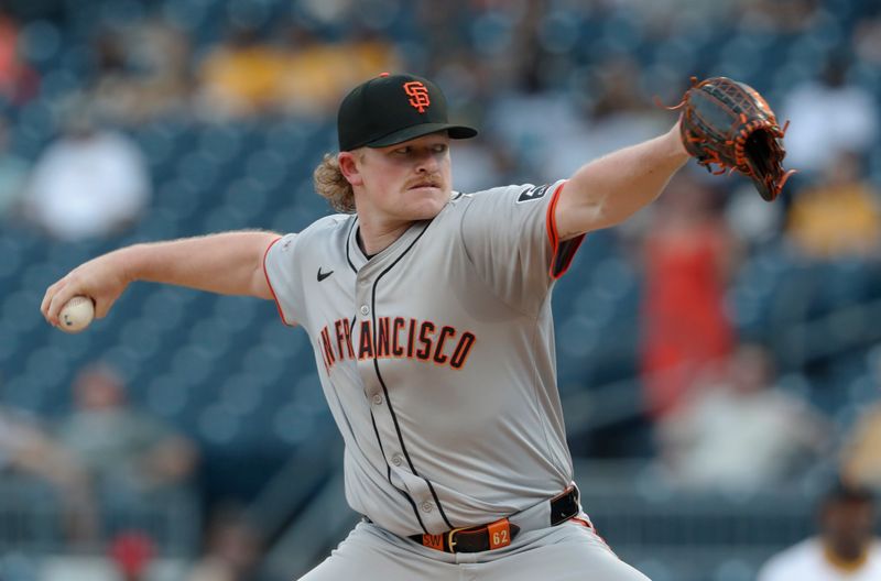 May 21, 2024; Pittsburgh, Pennsylvania, USA;  San Francisco Giants starting pitcher Logan Webb (62) delivers a pitch against the Pittsburgh Pirates during the first inning at PNC Park. Mandatory Credit: Charles LeClaire-USA TODAY Sports