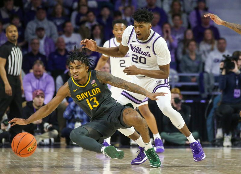 Jan 16, 2024; Manhattan, Kansas, USA; Baylor Bears guard Langston Love (13) loses the ball while guarded by Kansas State Wildcats forward Jerrell Colbert (20) during the first half at Bramlage Coliseum. Mandatory Credit: Scott Sewell-USA TODAY Sports