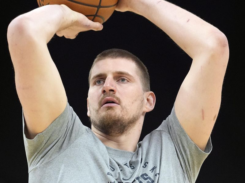 MILWAUKEE, WISCONSIN - FEBRUARY 27: Nikola Jokic #15 of the Denver Nuggets warms up before a game against the Milwaukee Bucks at Fiserv Forum on February 27, 2025 in Milwaukee, Wisconsin. NOTE TO USER: User expressly acknowledges and agrees that, by downloading and or using this photograph, User is consenting to the terms and conditions of the Getty Images License Agreement. (Photo by Patrick McDermott/Getty Images)