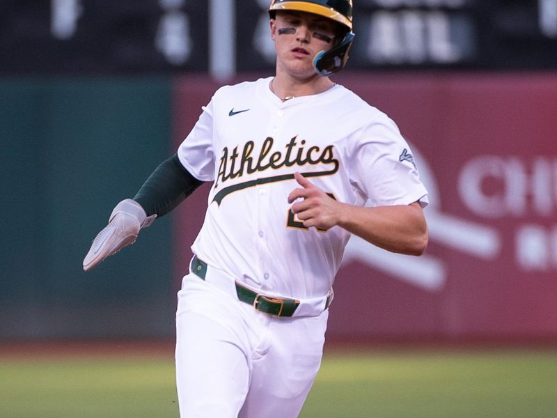 Jul 2, 2024; Oakland, California, USA; Oakland Athletics second base Zack Gelof (20) rounds the bases on a home run by outfielder Lawrence Butler (4, not pictured) during the fourth inning of the game against the Los Angeles Angels at Oakland-Alameda County Coliseum. Mandatory Credit: Ed Szczepanski-USA TODAY Sports