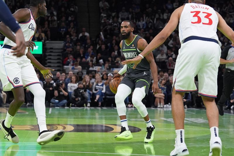 MINNEAPOLIS, MN -  NOVEMBER 29: Mike Conley #10 of the Minnesota Timberwolveshandles the ball during the game against the LA Clippers during the Emirates NBA Cup game on November 29, 2024 at Target Center in Minneapolis, Minnesota. NOTE TO USER: User expressly acknowledges and agrees that, by downloading and or using this Photograph, user is consenting to the terms and conditions of the Getty Images License Agreement. Mandatory Copyright Notice: Copyright 2024 NBAE (Photo by Jordan Johnson/NBAE via Getty Images)