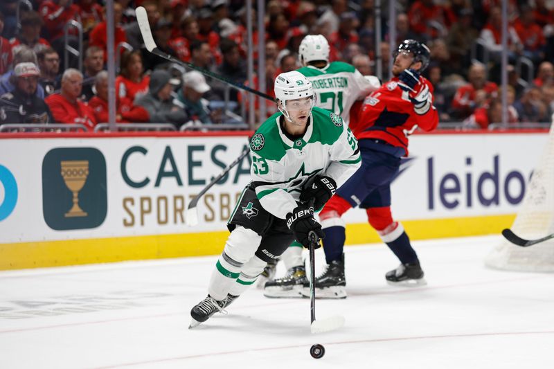 Oct 17, 2024; Washington, District of Columbia, USA; Dallas Stars center Wyatt Johnston (53) skates with the puck against the Washington Capitals in the second period at Capital One Arena. Mandatory Credit: Geoff Burke-Imagn Images