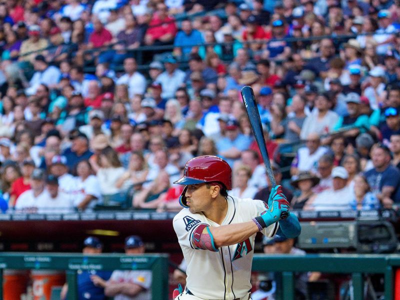 Apr 26, 2025; Phoenix, Arizona, USA;  Arizona Diamondbacks outfielder Corbin Carroll (7) at bat in the third inning against the Atlanta Braves at Chase Field. Mandatory Credit: Allan Henry-Imagn Images