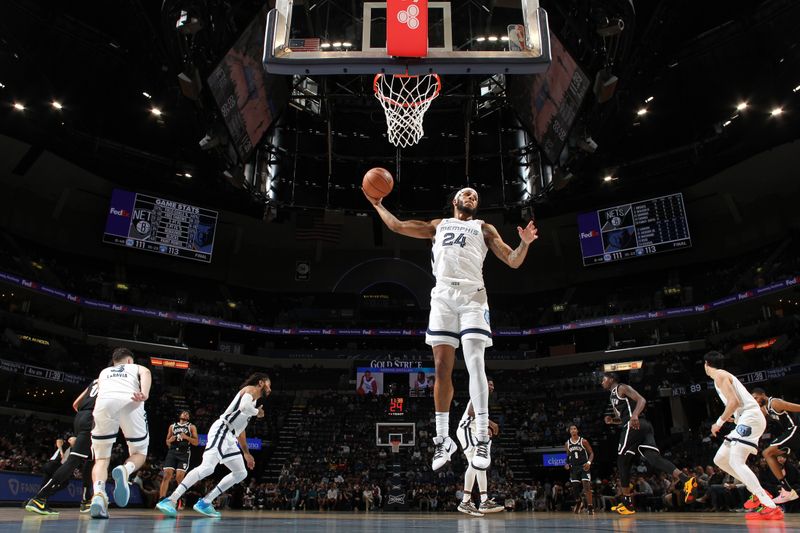 MEMPHIS, TN - February 26:  Lamar Stevens #24 of the Memphis Grizzlies grabs a rebound during the game against the Brooklyn Nets on February 26, 2024 at FedExForum in Memphis, Tennessee. NOTE TO USER: User expressly acknowledges and agrees that, by downloading and or using this photograph, User is consenting to the terms and conditions of the Getty Images License Agreement. Mandatory Copyright Notice: Copyright 2024 NBAE (Photo by Joe Murphy/NBAE via Getty Images)