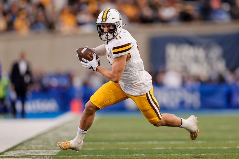 Oct 14, 2023; Colorado Springs, Colorado, USA; Wyoming Cowboys wide receiver Wyatt Wieland (11) runs the ball on a reception in the second quarter against the Air Force Falcons at Falcon Stadium. Mandatory Credit: Isaiah J. Downing-USA TODAY Sports