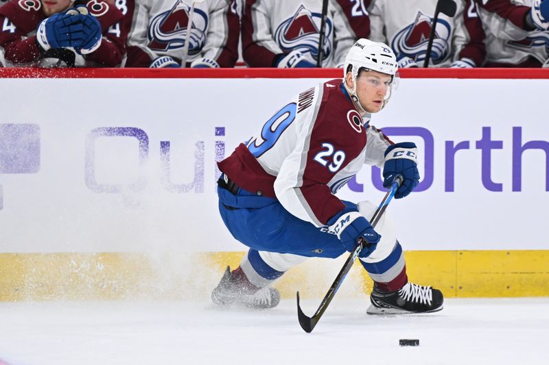 Dec 19, 2023; Chicago, Illinois, USA; Colorado Avalanche forward Nathan MacKinnon (29) controls the puck in the first period against the Chicago Blackhawks  at United Center. Mandatory Credit: Jamie Sabau-USA TODAY Sports