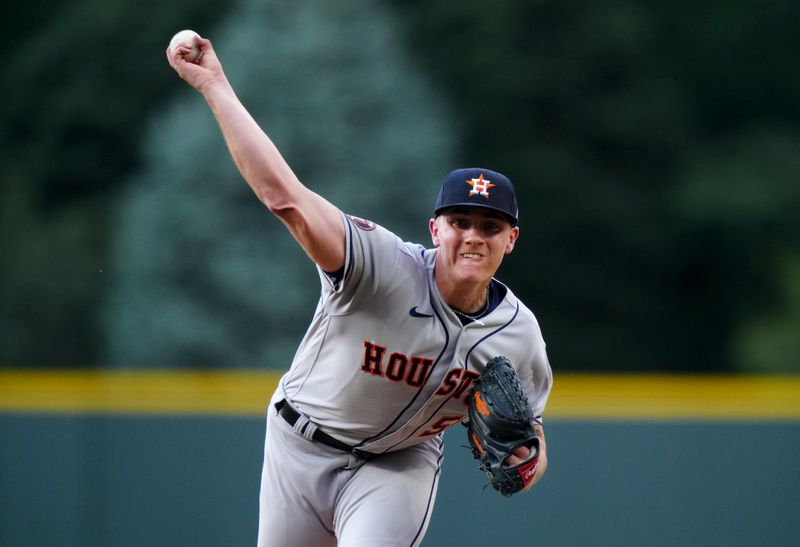 Jul 18, 2023; Denver, Colorado, USA; Houston Astros starting pitcher Hunter Brown (58) delivers a pitch in the first inning against the Colorado Rockies at Coors Field. Mandatory Credit: Ron Chenoy-USA TODAY Sports