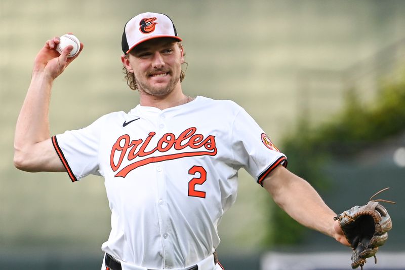 Sep 4, 2024; Baltimore, Maryland, USA;  Baltimore Orioles shortstop Gunnar Henderson (2) smile while warming up before the game against the Chicago White Sox at Oriole Park at Camden Yards. Mandatory Credit: Tommy Gilligan -Imagn Images
