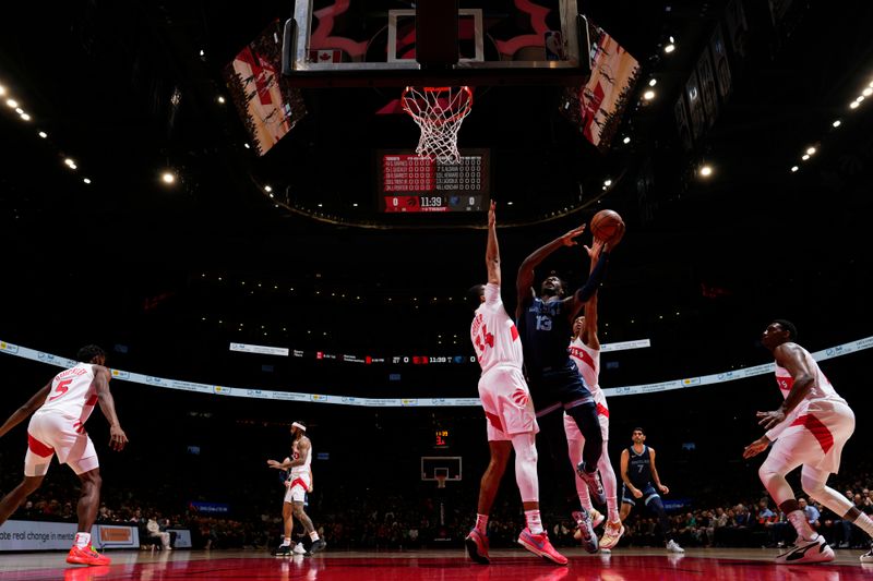 TORONTO, CANADA - JANUARY 22: Jaren Jackson Jr. #13 of the Memphis Grizzlies drives to the basket during the game against the Toronto Raptors on January 22, 2024 at the Scotiabank Arena in Toronto, Ontario, Canada.  NOTE TO USER: User expressly acknowledges and agrees that, by downloading and or using this Photograph, user is consenting to the terms and conditions of the Getty Images License Agreement.  Mandatory Copyright Notice: Copyright 2024 NBAE (Photo by Mark Blinch/NBAE via Getty Images)