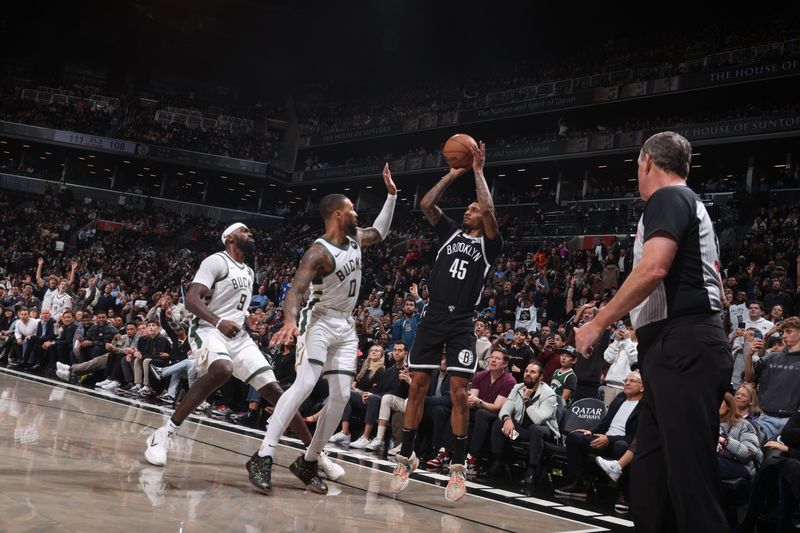 BROOKLYN, NY - DECEMBER 8: Keon Johnson #45 of the Brooklyn Nets shoots a three point basket during the game against the Milwaukee Bucks on December 8, 2024 at Barclays Center in Brooklyn, New York. NOTE TO USER: User expressly acknowledges and agrees that, by downloading and or using this Photograph, user is consenting to the terms and conditions of the Getty Images License Agreement. Mandatory Copyright Notice: Copyright 2024 NBAE (Photo by Nathaniel S. Butler/NBAE via Getty Images)