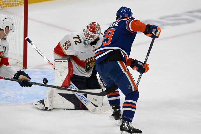 Jun 6, 2025; Edmonton, Alberta, CAN; Edmonton Oilers center Adam Henrique (19) shoots on Florida Panthers goaltender Sergei Bobrovsky (72) during the second period in game two of the 2025 Stanley Cup Final at Rogers Place. Mandatory Credit: Walter Tychnowicz-Imagn Images