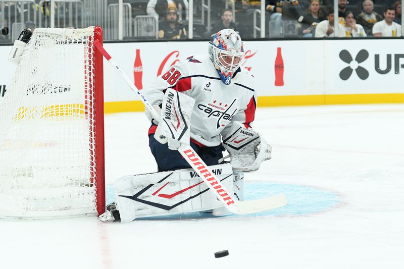 Sep 21, 2025; Boston, Massachusetts, USA; Washington Capitals goaltender Garin Bjorklund (68) makes a save during the third period against the Boston Bruins at TD Garden. Mandatory Credit: Bob DeChiara-Imagn Images