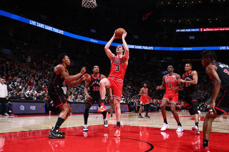 TORONTO, CANADA - JANUARY 31: Josh Giddey #3 of the Chicago Bulls drives to the basket during the game against the Toronto Raptors   on January 31, 2025 at the Scotiabank Arena in Toronto, Ontario, Canada.  NOTE TO USER: User expressly acknowledges and agrees that, by downloading and or using this Photograph, user is consenting to the terms and conditions of the Getty Images License Agreement.  Mandatory Copyright Notice: Copyright 2025 NBAE (Photo by Vaughn Ridley/NBAE via Getty Images)