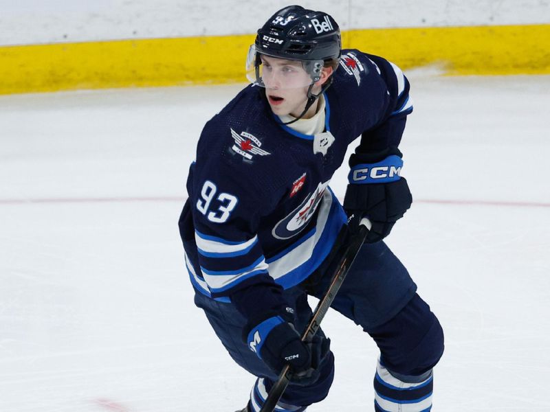 Apr 18, 2024; Winnipeg, Manitoba, CAN;  Winnipeg Jets forward Brad Lambert (93) looks to make a pass against the Vancouver Canucks during the third period at Canada Life Centre. Mandatory Credit: Terrence Lee-USA TODAY Sports