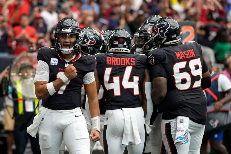 Houston Texans quarterback C.J. Stroud (7) celebrates after a touchdown pass during the second half of an NFL football game against the Jacksonville Jaguars, Sunday, Sept. 29, 2024, in Houston. The Texans won 24-20. (AP Photo/Eric Gay)