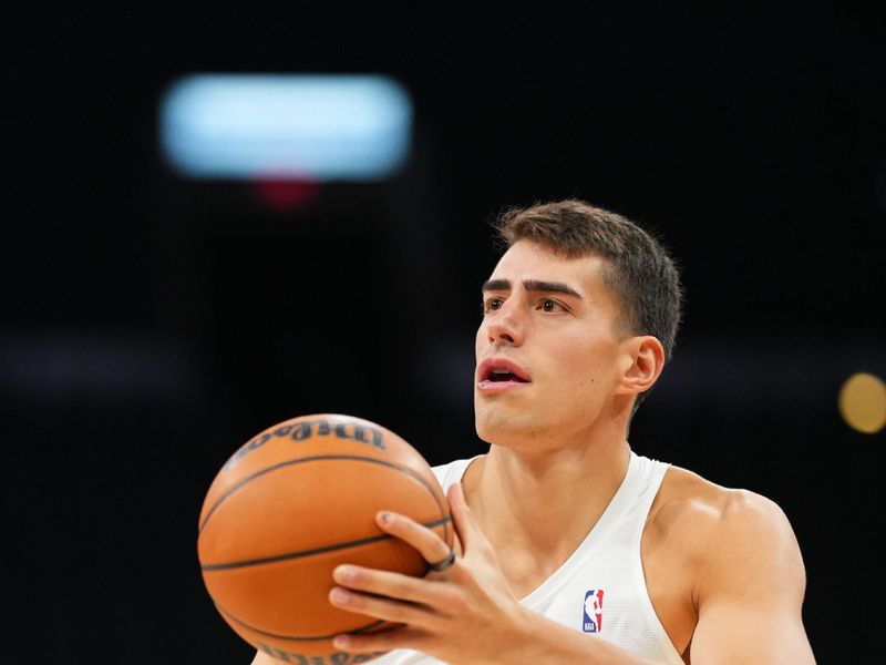 SAN ANTONIO, TX - NOVEMBER 2:Luka Garza #55 of the Minnesota Timberwolves warms up before the game against the San Antonio Spurs on November 2, 2024 at the Frost Bank Center in San Antonio, Texas. NOTE TO USER: User expressly acknowledges and agrees that, by downloading and or using this photograph, user is consenting to the terms and conditions of the Getty Images License Agreement. Mandatory Copyright Notice: Copyright 2024 NBAE (Photos by Cooper Neill/NBAE via Getty Images)