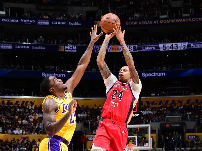 LOS ANGELES, CA - MARCH 4: Jordan Hawkins #24 of the New Orleans Pelicans shoots the ball during the game against the Los Angeles Lakers on March 4, 2025 at Crypto.Com Arena in Los Angeles, California. NOTE TO USER: User expressly acknowledges and agrees that, by downloading and/or using this Photograph, user is consenting to the terms and conditions of the Getty Images License Agreement. Mandatory Copyright Notice: Copyright 2025 NBAE (Photo by Adam Pantozzi/NBAE via Getty Images)