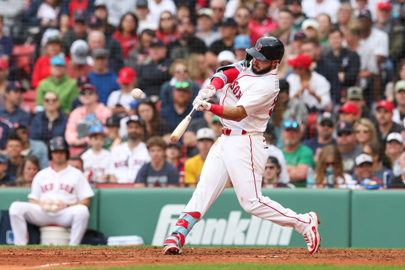 May 4, 2025; Boston, Massachusetts, USA; Boston Red Sox right fielder Wilyer Abreu (52) hits a solo home run during the eighth inning against the Minnesota Twins at Fenway Park. Mandatory Credit: Paul Rutherford-Imagn Images