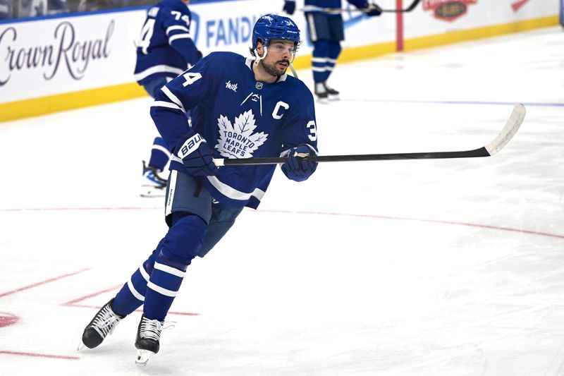Jan 1, 2026; Toronto, Ontario, CAN;  Toronto Maple Leafs forward Auston Matthews (34) warms up before playing the Winnipeg Jets at Scotiabank Arena. Mandatory Credit: Dan Hamilton-Imagn Images