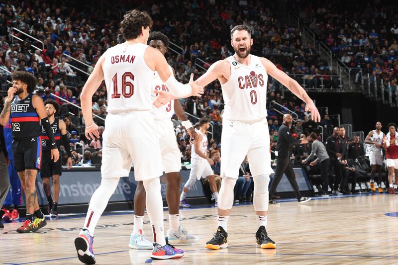 DETROIT, MI - NOVEMBER 4: Kevin Love #0 of the Cleveland Cavaliers high fives team mate during the game against the Detroit Pistons on November 4, 2022 at Little Caesars Arena in Detroit, Michigan. NOTE TO USER: User expressly acknowledges and agrees that, by downloading and/or using this photograph, User is consenting to the terms and conditions of the Getty Images License Agreement. Mandatory Copyright Notice: Copyright 2022 NBAE (Photo by Chris Schwegler/NBAE via Getty Images)