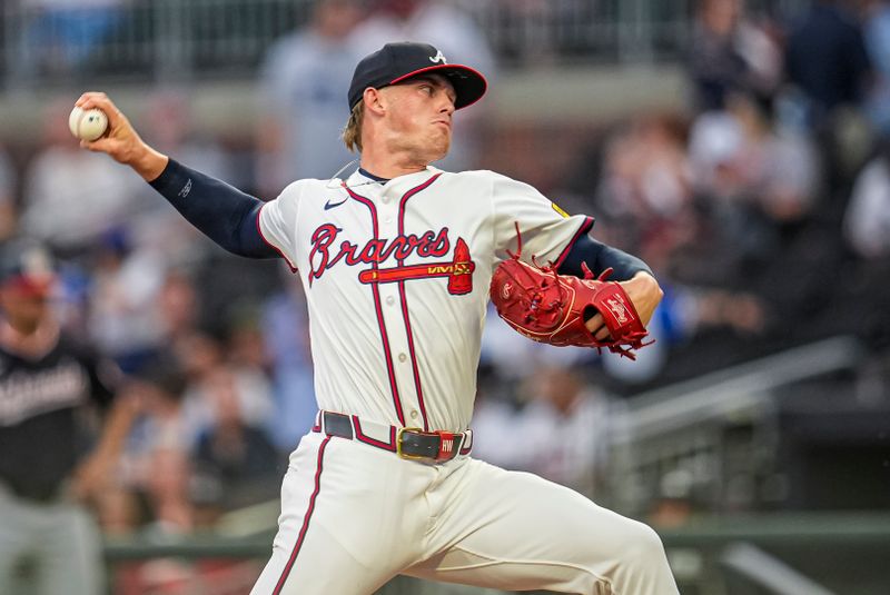 Sep 23, 2025; Cumberland, Georgia, USA; Atlanta Braves starting pitcher Hurston Waldrep (64) pitches against the Washington Nationals during the first inning at Truist Park. Mandatory Credit: Dale Zanine-Imagn Images