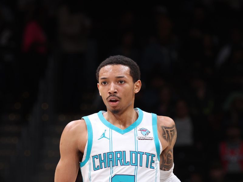 WASHINGTON, DC -? MARCH 8:  Nick Smith Jr. #8 of the Charlotte Hornets handles the ball during the game  on March 8, 2024 at Capital One Arena in Washington, DC. NOTE TO USER: User expressly acknowledges and agrees that, by downloading and or using this Photograph, user is consenting to the terms and conditions of the Getty Images License Agreement. Mandatory Copyright Notice: Copyright 2024 NBAE (Photo by Stephen Gosling/NBAE via Getty Images)