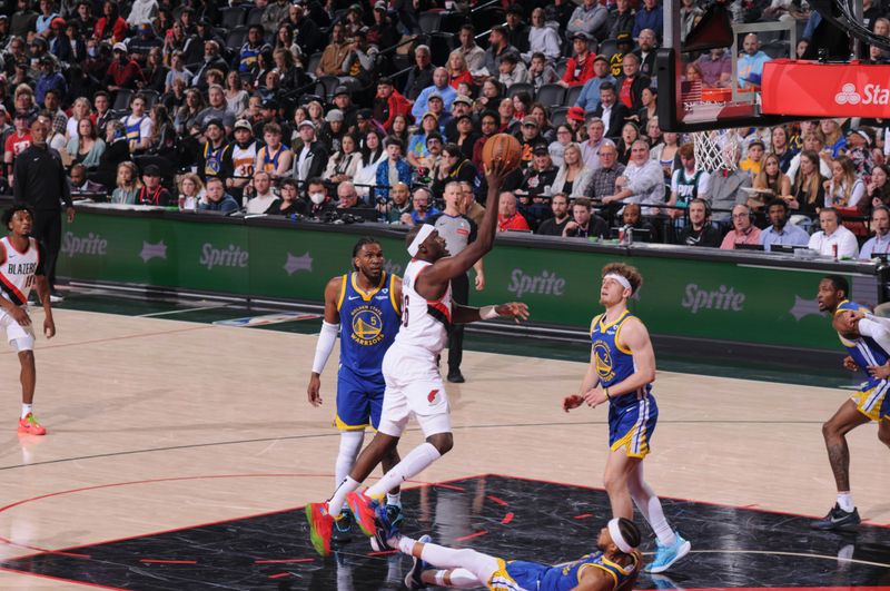 PORTLAND, OR - APRIL 11:  Duop Reath #26 of the Portland Trail Blazers goes to the basket during the game on April 11, 2024 at the Moda Center Arena in Portland, Oregon. NOTE TO USER: User expressly acknowledges and agrees that, by downloading and or using this photograph, user is consenting to the terms and conditions of the Getty Images License Agreement. Mandatory Copyright Notice: Copyright 2024 NBAE (Photo by Cameron Browne/NBAE via Getty Images)