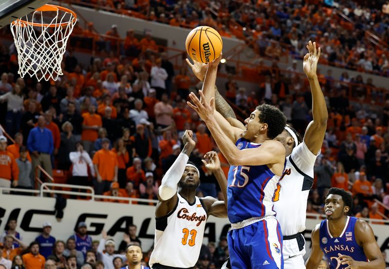 Feb 14, 2023; Stillwater, Oklahoma, USA; Kansas Jayhawks guard Kevin McCullar Jr. (15) shoots against the Oklahoma State Cowboys during the second half at Gallagher-Iba Arena. Kansas won 87-76. Mandatory Credit: Alonzo Adams-USA TODAY Sports