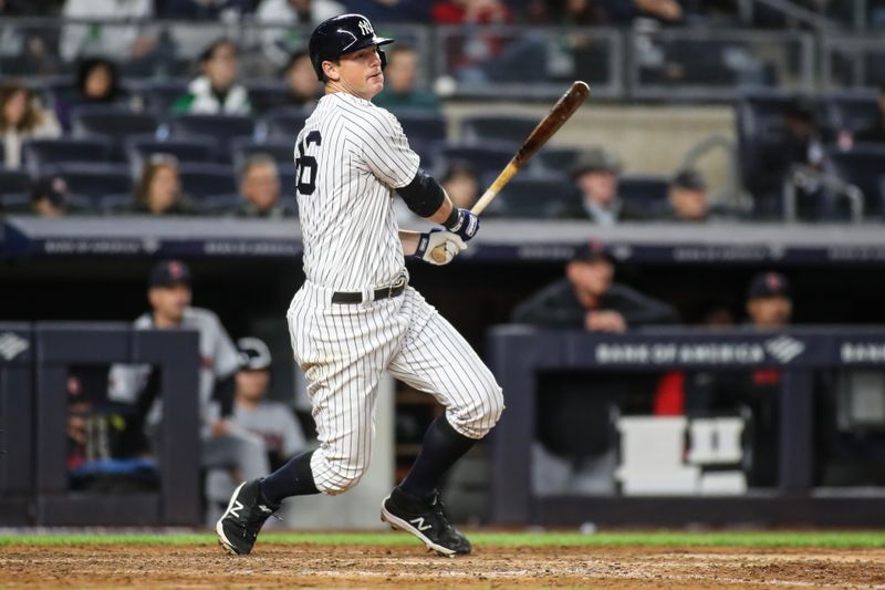 May 2, 2023; Bronx, New York, USA;  New York Yankees third baseman DJ LeMahieu (26) hits a RBI single in the eighth inning against the Cleveland Guardians at Yankee Stadium. Mandatory Credit: Wendell Cruz-USA TODAY Sports