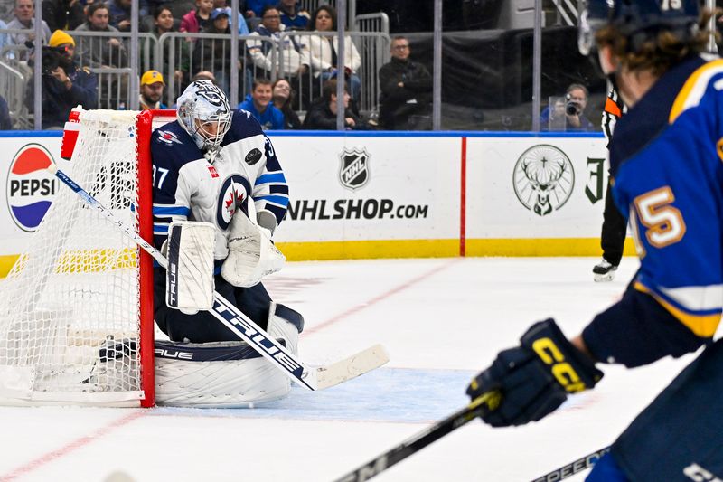 Nov 7, 2023; St. Louis, Missouri, USA;  Winnipeg Jets goaltender Connor Hellebuyck (37) defends the net against the St. Louis Blues during the second period at Enterprise Center. Mandatory Credit: Jeff Curry-USA TODAY Sports