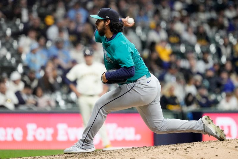 Apr 6, 2024; Milwaukee, Wisconsin, USA;  Seattle Mariners pitcher Andres Munoz (75) throws a pitch during the ninth inning against the Milwaukee Brewers at American Family Field. Mandatory Credit: Jeff Hanisch-USA TODAY Sports