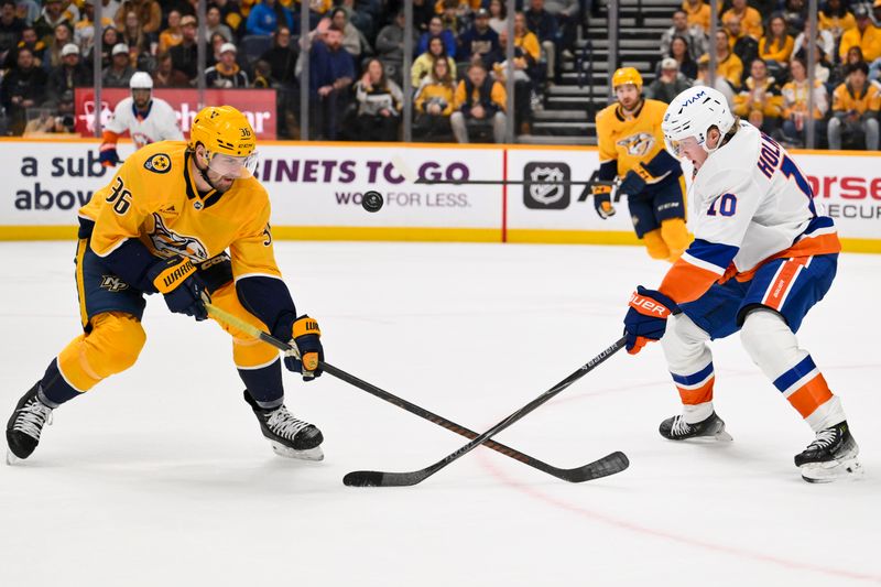 Jan 8, 2026; Nashville, Tennessee, USA; New York Islanders right wing Simon Holmstrom (10) and Nashville Predators left wing Cole Smith (36) battle for the puck during the second period at Bridgestone Arena. Mandatory Credit: Steve Roberts-Imagn Images