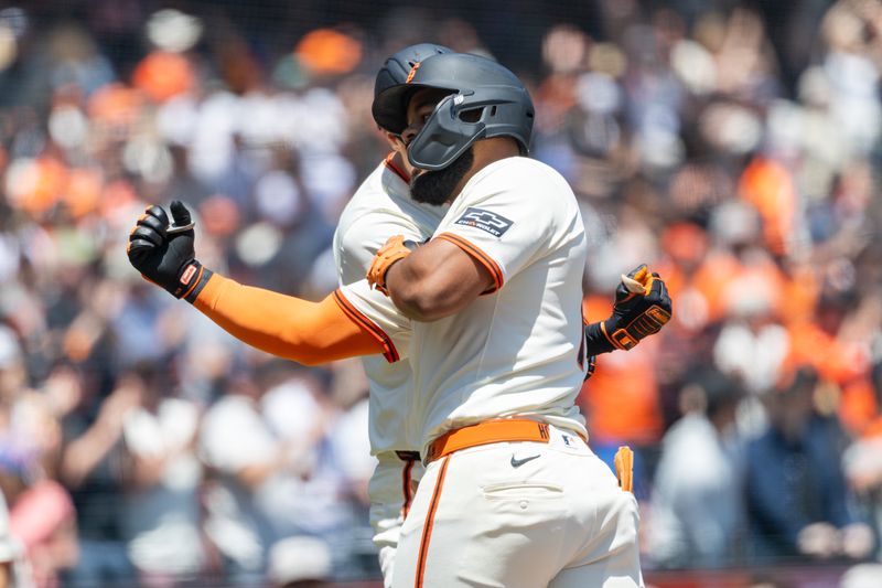 May 18, 2025; San Francisco, California, USA; San Francisco Giants outfielder Heliot Ramos (17) celebrates after hitting a solo home run during the first inning against the Oakland Athletics at Oracle Park. Mandatory Credit: Bob Kupbens-Imagn Images