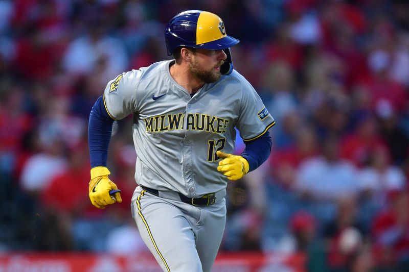 Jun 18, 2024; Anaheim, California, USA; Milwaukee Brewers first base Rhys Hoskins (12) runs after hitting a single against the Los Angeles Angels during the sixth inning at Angel Stadium. Mandatory Credit: Gary A. Vasquez-USA TODAY Sports