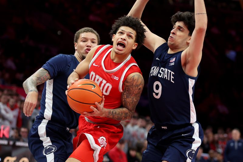 Jan 26, 2026; Columbus, Ohio, USA; Ohio State Buckeyes guard John Mobley Jr. (0) is fouled by Penn State Nittany Lions guard Melih Tunca (9) during the second half at Value City Arena. Mandatory Credit: Joseph Maiorana-Imagn Images