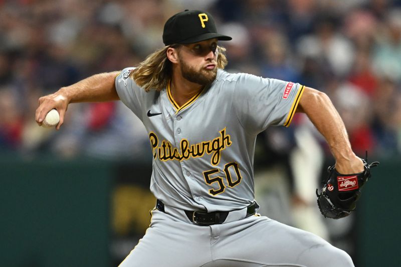 Aug 30, 2024; Cleveland, Ohio, USA; Pittsburgh Pirates relief pitcher Carmen Mlodzinski (50) throws a pitch during the fifth inning against the Cleveland Guardians at Progressive Field. Mandatory Credit: Ken Blaze-USA TODAY Sports