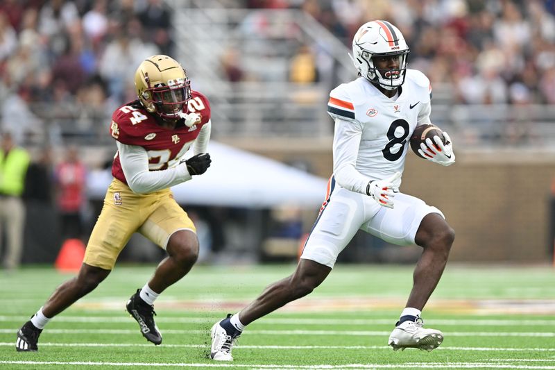 Sep 30, 2023; Chestnut Hill, Massachusetts, USA; Virginia Cavaliers wide receiver Malachi Fields (8) runs with the ball in front of Boston College Eagles cornerback Amari Jackson (24) during the first half at Alumni Stadium. Mandatory Credit: Brian Fluharty-USA TODAY Sports