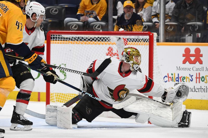 Feb 27, 2024; Nashville, Tennessee, USA; Ottawa Senators goaltender Joonas Korpisalo (70) makes a save during the third period against the Nashville Predators at Bridgestone Arena. Mandatory Credit: Christopher Hanewinckel-USA TODAY Sports