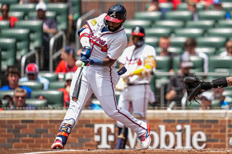 Jun 5, 2025; Cumberland, Georgia, USA; Atlanta Braves center fielder Michael Harris II (23) breaks his bat while hitting a pop up against the Arizona Diamondbacks during the third inning at Truist Park. Mandatory Credit: Dale Zanine-Imagn Images