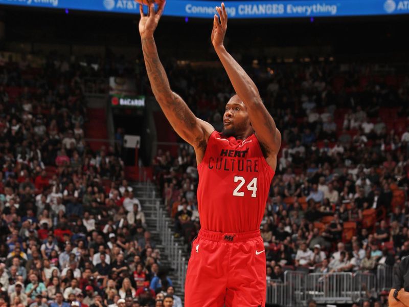 MIAMI, FL - NOVEMBER 18: Haywood Highsmith #24 of the Miami Heat shoots a three point basket during the game against the Philadelphia 76ers on November 18, 2024 at Kaseya Center in Miami, Florida. NOTE TO USER: User expressly acknowledges and agrees that, by downloading and or using this Photograph, user is consenting to the terms and conditions of the Getty Images License Agreement. Mandatory Copyright Notice: Copyright 2024 NBAE (Photo by Issac Baldizon/NBAE via Getty Images)