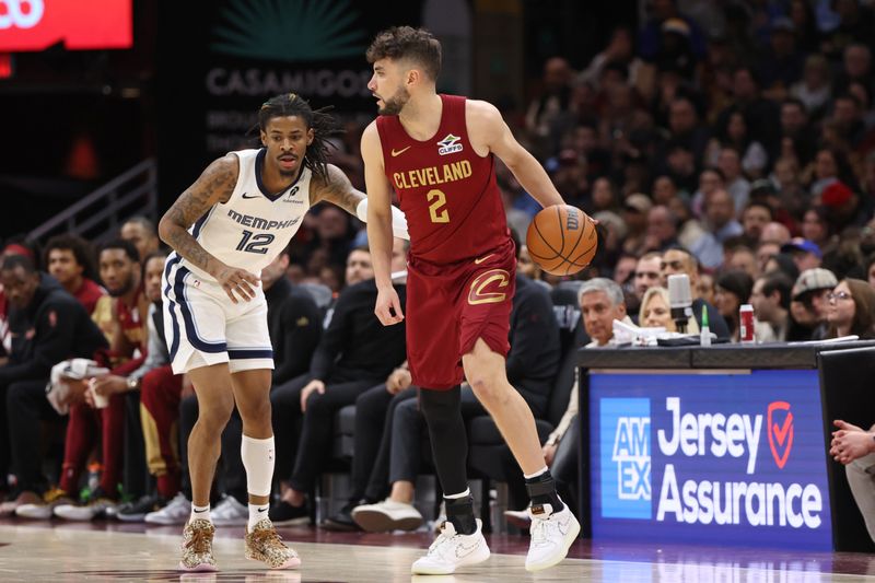 CLEVELAND, OH - FEBRUARY 23: Ty Jerome #2 of the Cleveland Cavaliers dribbles the ball during the game against the Memphis Grizzlies on February 23, 2025 at Rocket Arena in Cleveland, Ohio. NOTE TO USER: User expressly acknowledges and agrees that, by downloading and/or using this Photograph, user is consenting to the terms and conditions of the Getty Images License Agreement. Mandatory Copyright Notice: Copyright 2025 NBAE (Photo by Joe Murphy/NBAE via Getty Images)