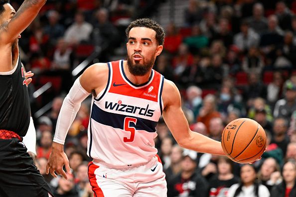 PORTLAND, OREGON - DECEMBER 21: Tyus Jones #5 of the Washington Wizards dribbles during the second quarter of the game against the Portland Trail Blazers at the Moda Center on December 21, 2023 in Portland, Oregon. The Washington Wizards won 118-117. NOTE TO USER: User expressly acknowledges and agrees that, by downloading and or using this photograph, User is consenting to the terms and conditions of the Getty Images License Agreement. (Photo by Alika Jenner/Getty Images)