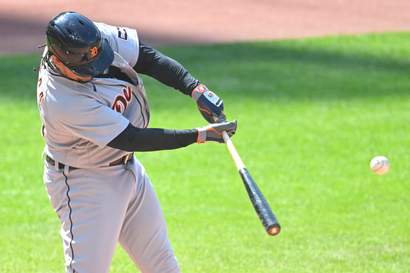 Aug 20, 2023; Cleveland, Ohio, USA; Detroit Tigers designated hitter Miguel Cabrera (24) singles in his last at bat at Progressive Field in the eighth inning against the Cleveland Guardians. Mandatory Credit: David Richard-USA TODAY Sports