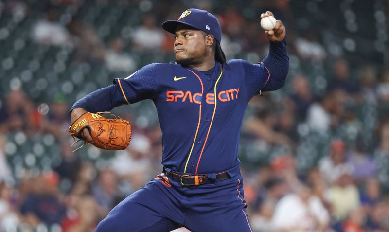 Sep 11, 2023; Houston, Texas, USA; Houston Astros starting pitcher Framber Valdez (59) delivers a pitch during the first inning against the Oakland Athletics at Minute Maid Park. Mandatory Credit: Troy Taormina-USA TODAY Sports