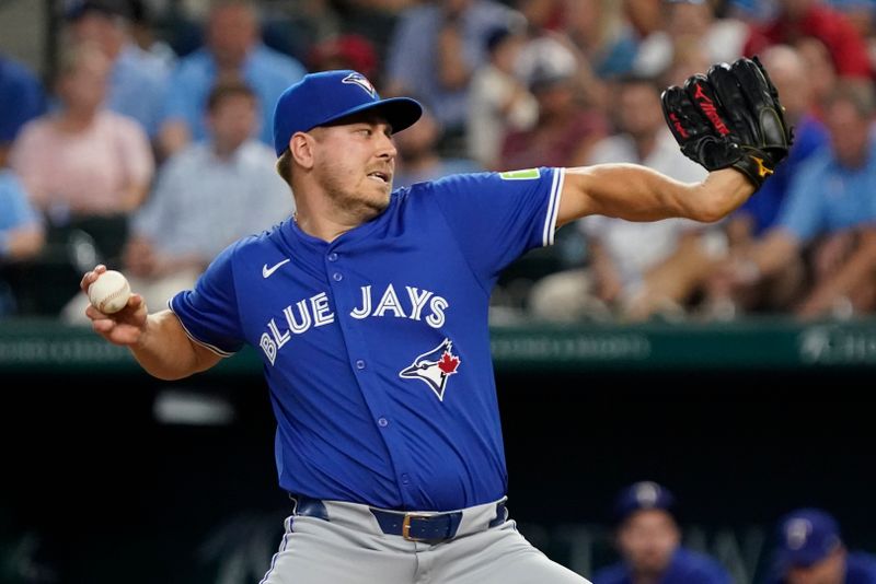 Sep 19, 2024; Arlington, Texas, USA; Toronto Blue Jays pitcher Erik Swanson (50) throws to the plate during the eighth inning against the Texas Rangers at Globe Life Field. Mandatory Credit: Raymond Carlin III-Imagn Images