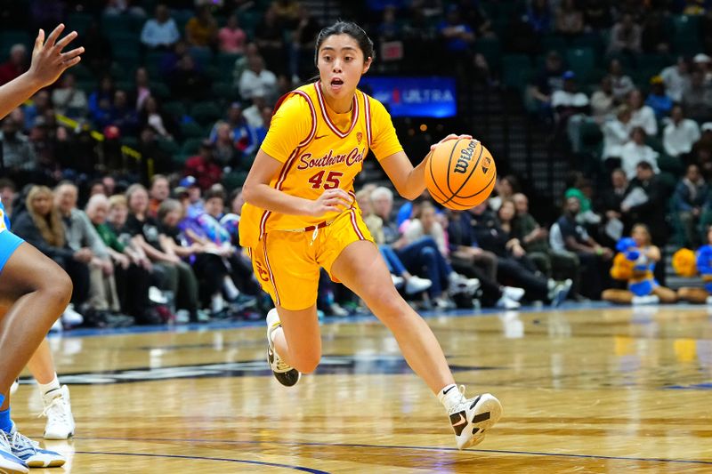 Mar 8, 2024; Las Vegas, NV, USA; USC Trojans guard Kayla Padilla (45) dribbles against the UCLA Bruins during the third quarter at MGM Grand Garden Arena. Mandatory Credit: Stephen R. Sylvanie-USA TODAY Sports